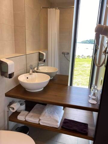 Фото номера Двухместный номер с 2 отдельными кроватями Отель Tulivee Villa г. Liimala 6