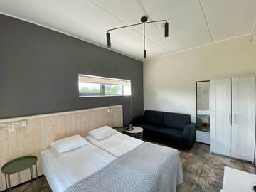Фото номера Двухместный номер с 2 отдельными кроватями Отель Tulivee Villa г. Liimala 3